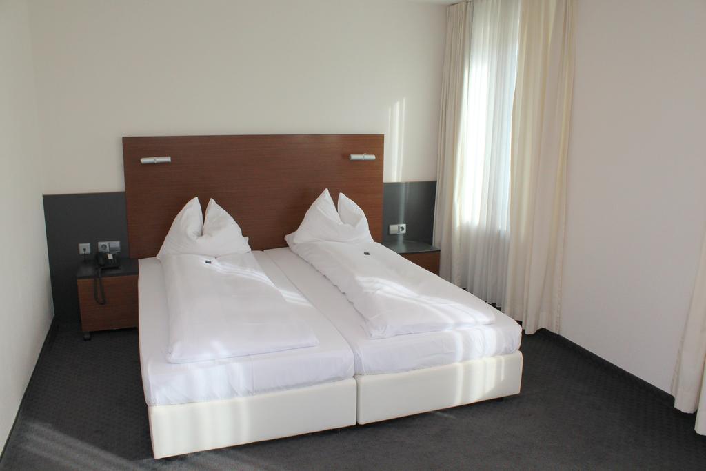 Hotel Am Hirschgarten Filderstadt Værelse billede